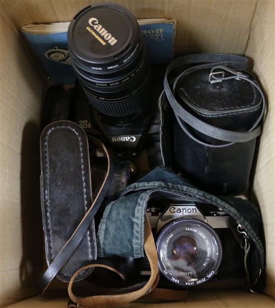 Three various cameras and lenses